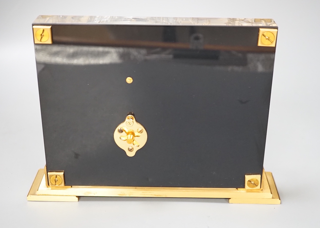 A Jaeger le Coultre mantel clock in Japanese style, 16cm tall, 22cm wide at feet